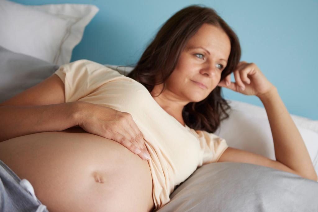 Боль в почках при беременности: симптомы